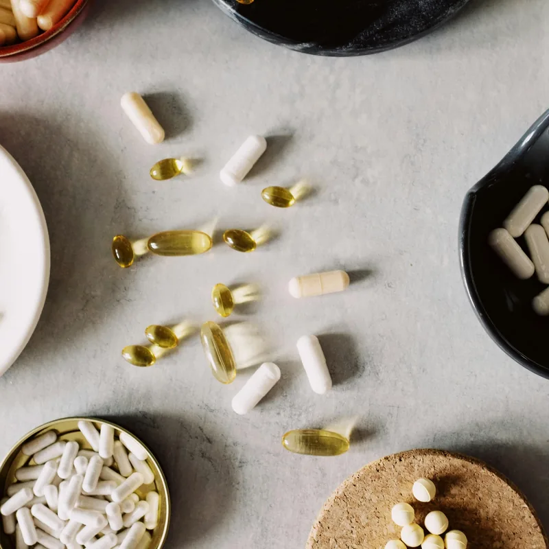 Assorted multivitamin capsules and tablets